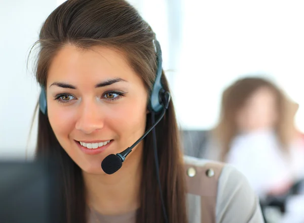 Customer support representative wearing a headset