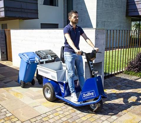 Ride-on Zallys vehicle transporting wheelie bins